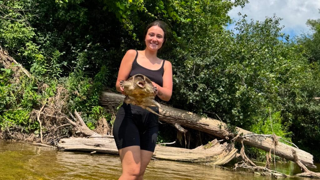 Woman holding turle grand river kitchener