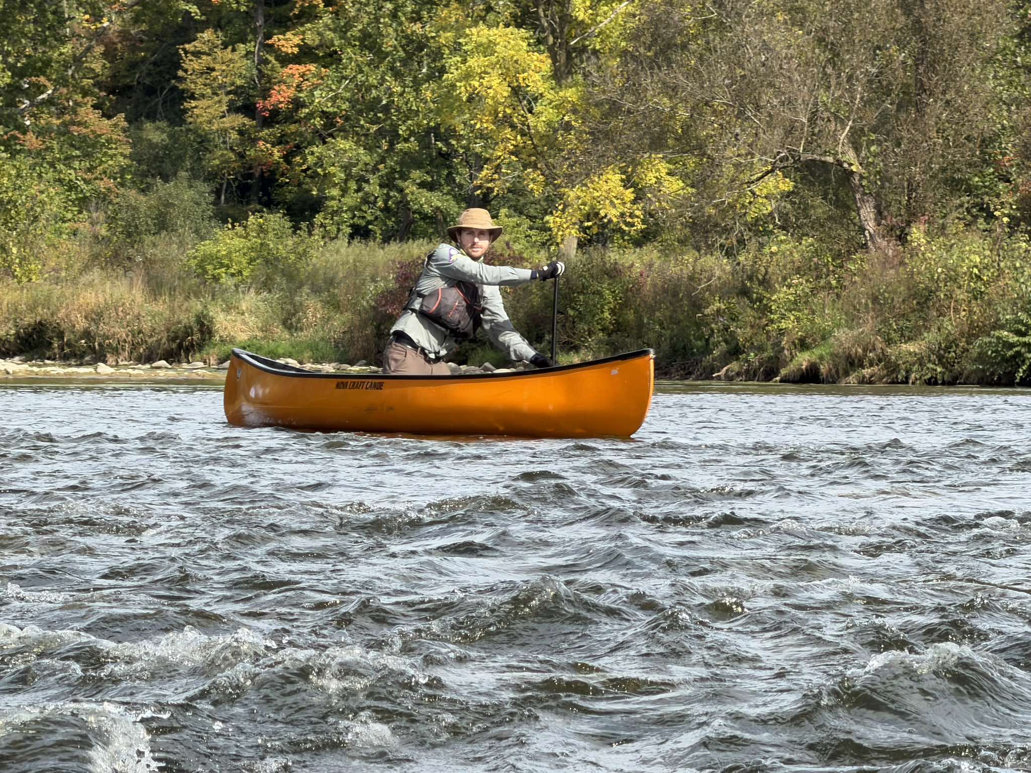 Adam Shoalts navigating rapids on the grand river