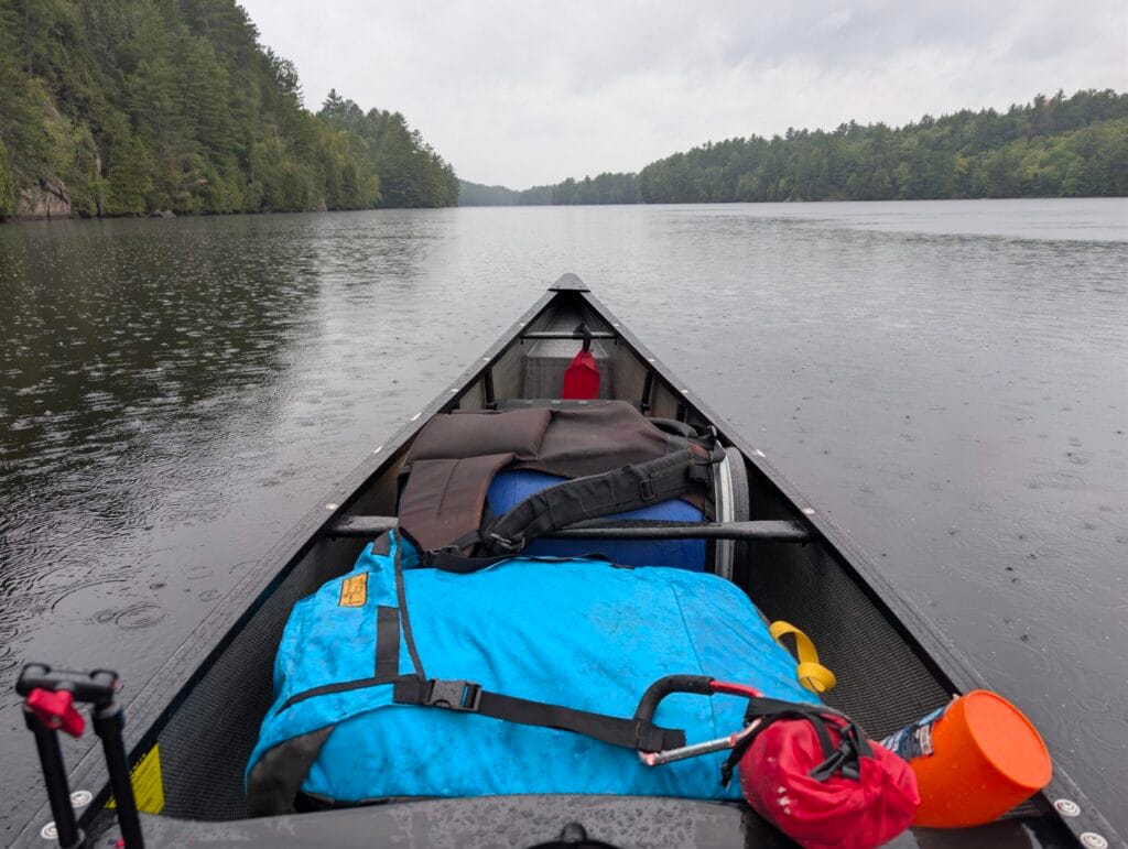 Canoeing in the rain on Kawigamog Lake